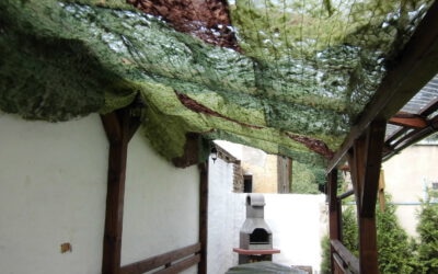 Pergola s dřevníkem